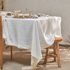Toalha de mesa retangular bordada ponto aberto em linho lavado marfim