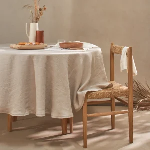 Toalha de mesa redonda bordada ponto aberto em linho lavado natural